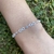 Pulsera doble infinitos en Plata 925 con cubics