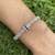 Pulsera premium con doble cierre de seguridad en Plata 925 rodinada con baguettes - comprar online