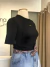 **NOVA** Camiseta cropped fit preta - MORMAII - comprar online