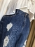Calça jeans boyfriend destroyed rebites nos bolsos - MORENA ROSA na internet