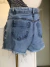 Short jeans com aplicações - loja online