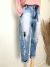 Calça jeans skinny destroyed; cinta alta - NINA MELANINA Boutique BRECHÓ