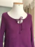 Blusa roxa mangas flare na internet