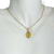 Colar Banhado Dourado - Corrente + Pingente búzio (Amarelo) - comprar online