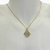 Colar Banhado Dourado - Quadrado cravejado com flor vazada no meio - comprar online