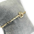 Bracelete Banhado Dourado - Trançado com nó no meio - comprar online