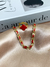 Kit pulseira esmaltada + anel trevo largo (Vermelho)