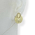 Brinco Banhado Dourado - Pino oval textura + circulo riscado - comprar online