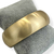 Bracelete Folheado a Ouro - Oval médio acetinado - comprar online