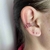 Piercing fake folheado a prata 3 voltas cravejado - Rubi - comprar online