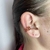 Piercing fake folheado a ouro 3 voltas cravejado - Rubi - comprar online
