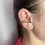 Piercing fake folheado a ouro 3 voltas cravejado - Rosa na internet