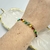 Pulseira fileira de strass com Cristais colorido pendurado