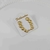 Brinco Ear cuff círculos com textura folheado ouro