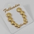 Brinco Ear cuff círculos com textura folheado ouro