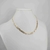 Colar choker escama de peixe com textura folheado a ouro