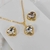 Conjunto colar + brinco folheado a ouro - Coração acrílico com borda (Cristal) - comprar online