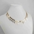 Colar choker folheado a ouro Crucifixos com corações liso