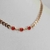 Colar choker folheado a ouro - folhas + 3 circulos cristais vermelho na internet