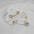 Conjunto colar + brinco circulo de vidro - Topázio azul