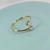 Bracelete folheado a ouro - ondulado dois corações Zircônia - comprar online