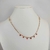 Colar Choker folheado a ouro - Strass + Strass Vermelho pendurado