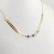 Colar choker folheada a ouro - escama de peixe com 2 olho grego Azul Escuro - comprar online