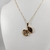 Colar Relicário oval pequeno com 2 corações trabalhado - Rosana Bijoux 