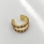 Piercing fake folheado a ouro vazado cravejado - Caramelo