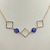 Colar choker folheado a ouro Quadrado de lado vazado + olho grego azul escuro - comprar online