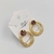 Brinco Circulo Textura de bolinha + Strass