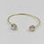Bracelete folheado a ouro - 2 corações Zircônia