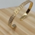 Bracelete folheado a ouro - Médio Riscado na internet