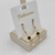 Brinco Pino Gota Fina + Strass + Cristal Preto com Concha pendurada - comprar online