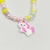 Conjunto infantil 3 em 1 - Colar, kit de pulseiras e laço - Gatinha Marie na internet
