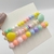 Kit de pulseiras infantil - Coração entre meio circulos coloridos e pérola