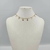 Colar Choker Folheado a ouro - Mini florzinhas riscada pendurada - comprar online