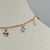 Colar Choker Folheado a ouro - Mini florzinhas riscada pendurada na internet