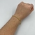 Pulseira Folheado a ouro - Corrente groumet + 2 strass grande entre meio 4 strass - Rosana Bijoux 