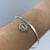 Pulseira Folheado a prata - Rabo de rato Circulo pequeno cravejado com mini paz no meio na internet