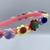 Tiara infantil - Florzinhas com pompom Colorido - comprar online