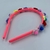 Tiara infantil - Florzinhas com pompom Colorido na internet