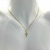 Colar Folheado a ouro - crucifixo entre meio pedrinhas zircônia - Rosana Bijoux 