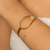 BRACELETE PONTO DE PÉROLA DOURADO