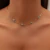 CHOKER MULTI OLHO GREGO DOURADO