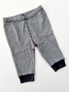 PANTALÓN LINEAS NEGRO Y GRIS MARCA CARTERS TALLE 3 MESES