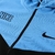 Conjunto Nike Sportswear Repeat (Azul Ciano) - Neri Imports | Camisas de Time
