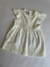 Vestido de broderie natural.