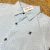 Camisa celeste pintitas azules - comprar online