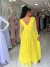Vestido Longo Amarelo Manga Longa Laço na internet